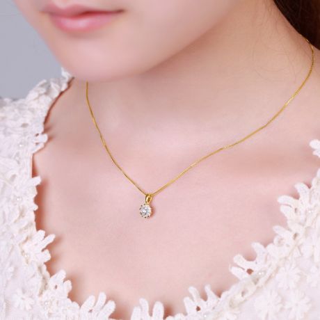Ciondolo in oro giallo e diamanti. Cuore di Pietra