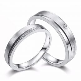 Fedi nuziali duo Oro bianco e diamanti. Una punta d'amore