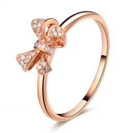 Anello piccolo nodo Oro giallo 18kt. Diamanti 0.080ct