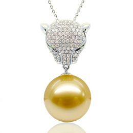 Ciondolo Pantera Perla Australia dorata. Oro bianco e Diaman